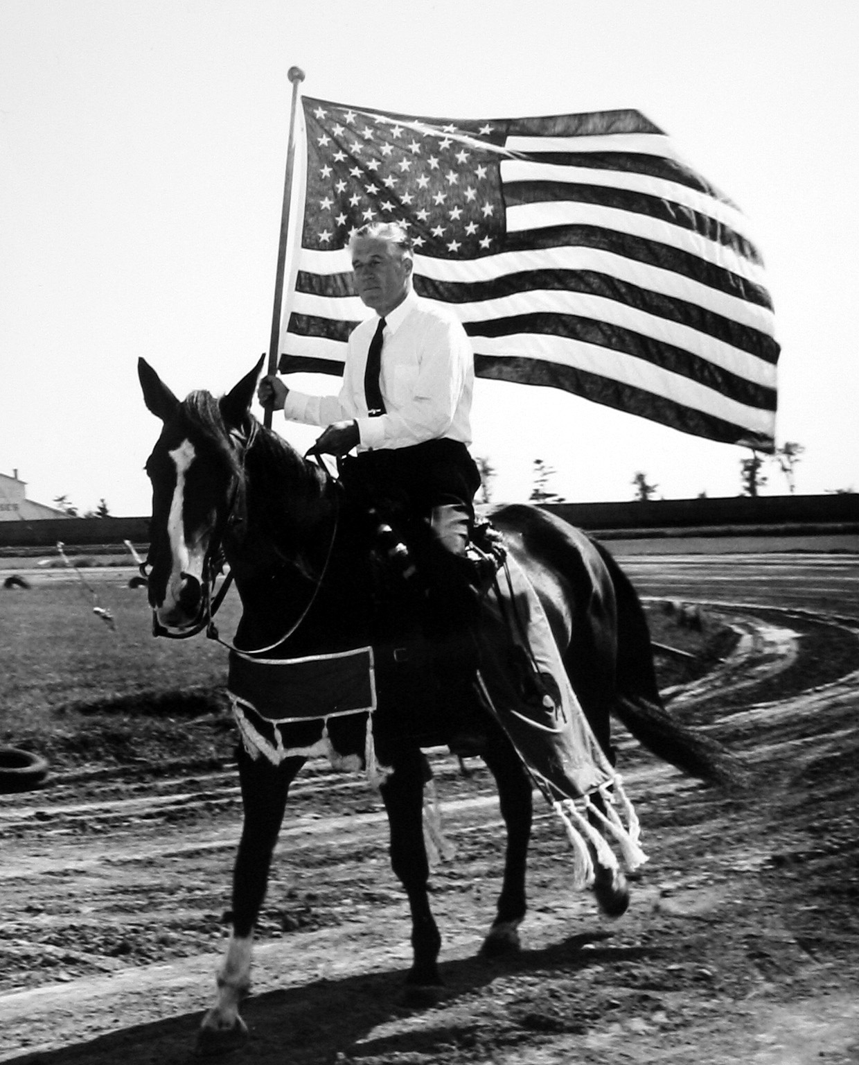 Governor George Romney;  American flag