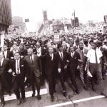 March dignitaries include L-R:
former Michigan Governor John Swainson, Walter Ruether, James Del Rio, Benjamin McFall, MLK, Rev. C.L. Franklin (Homburg hat)
