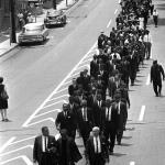 After Evers funeral in Jackson, the senior leaders (MLK & Rev Shuttlesworth, 2nd row) were allowed by the mayor to march on Farish Street under strick orders not to sing or shout slogans. 